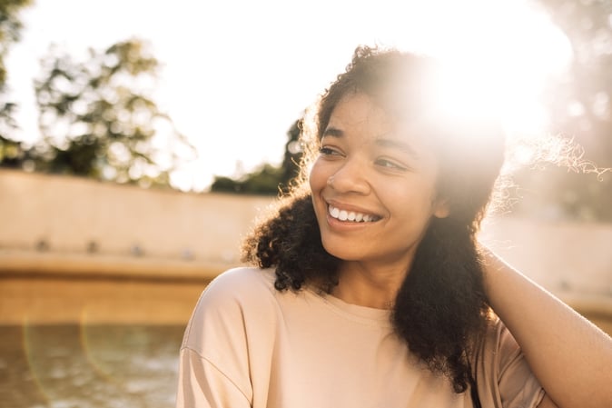 young woman after using skincare for sun damage