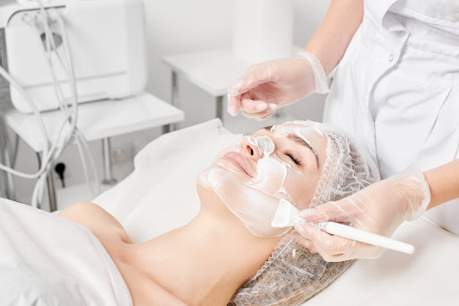 Woman getting glycolic acid facial peel